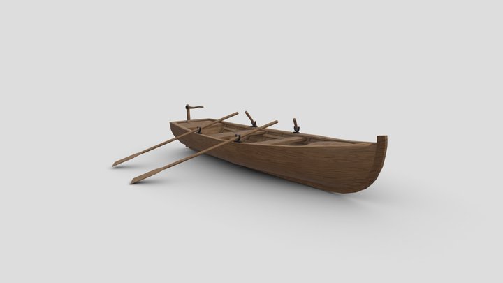 Wooden rowing boat with oars