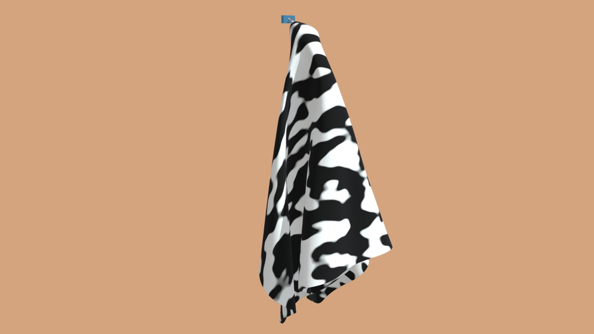 Cow- Patterned Towel On A Hook