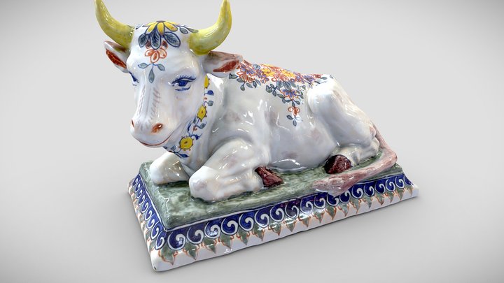 A lying ox with a wreath of flowers
