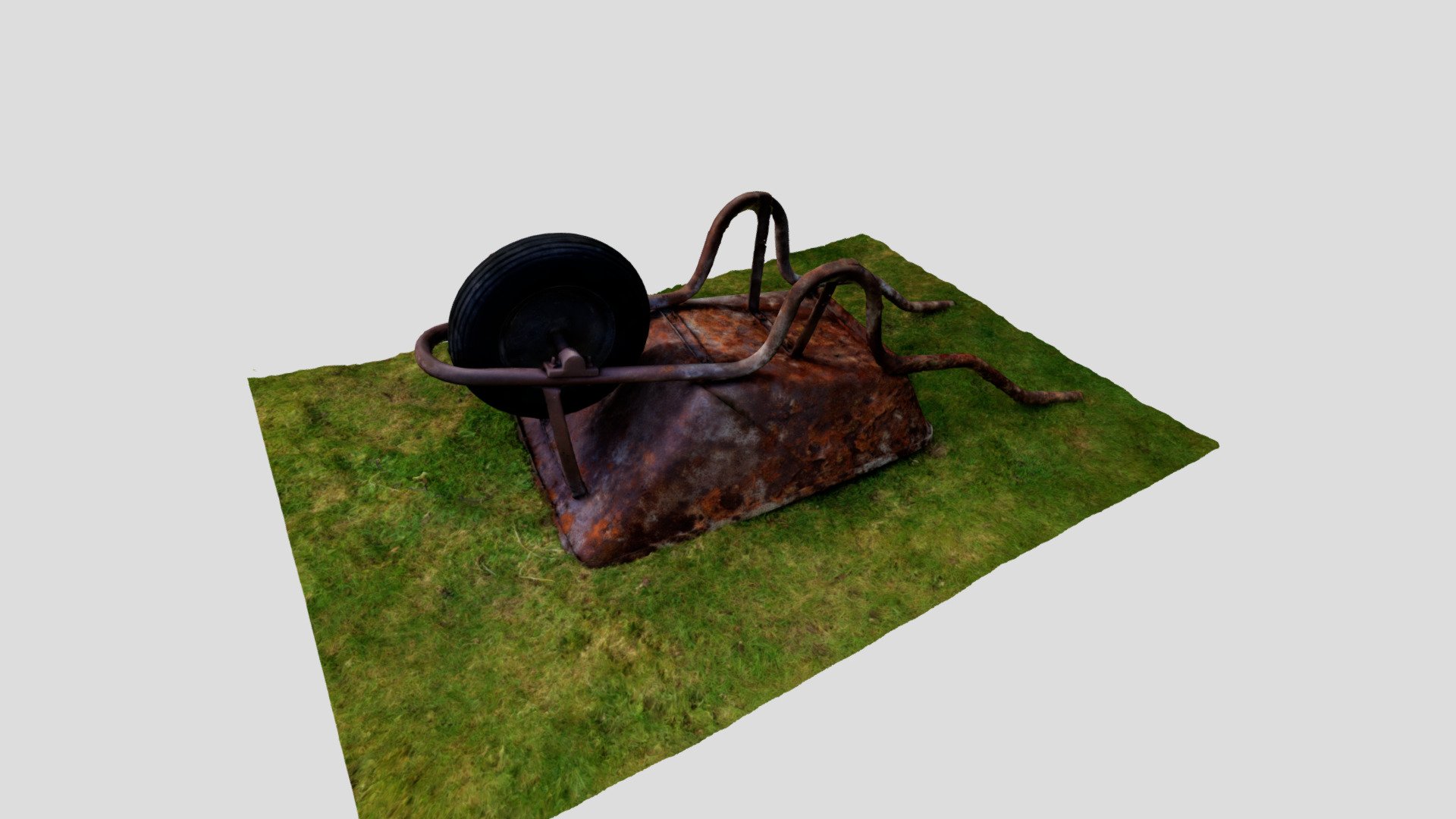Rusty upturned wheelbarrow