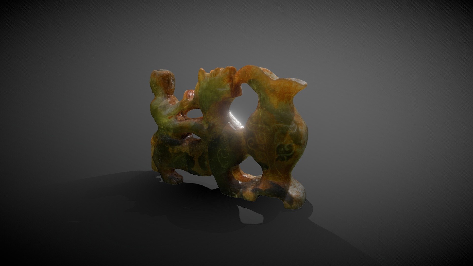 Qilin figure with rider in jade