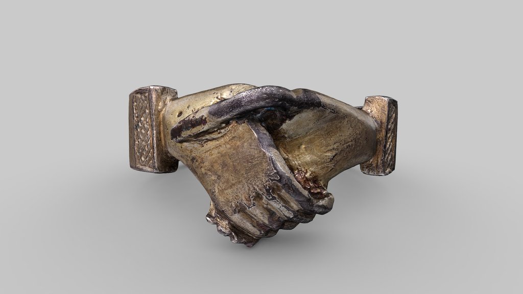 Ring with handshake motif