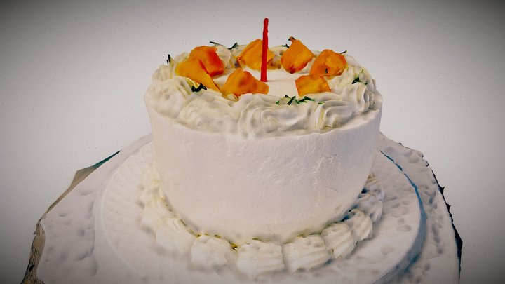 A Delicious Cake with Mango Chunks on Top