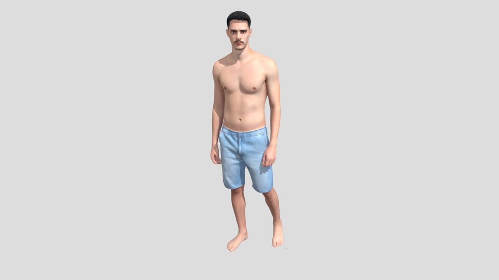 Shirtless man in denim shorts