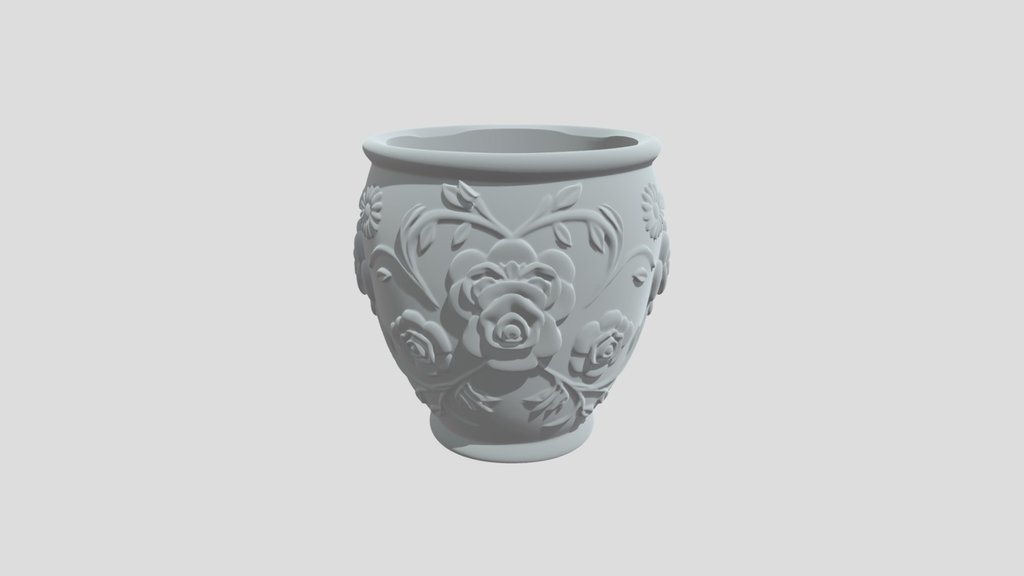 flower pot etched with flower designs