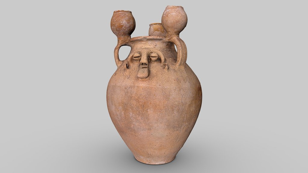 Urn with face