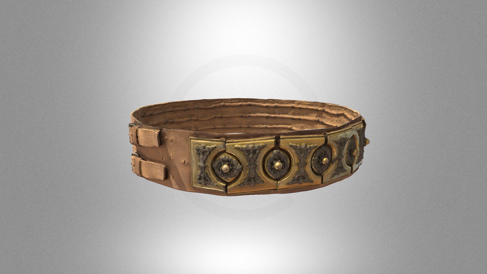 A leather belt decorated with metal ornaments