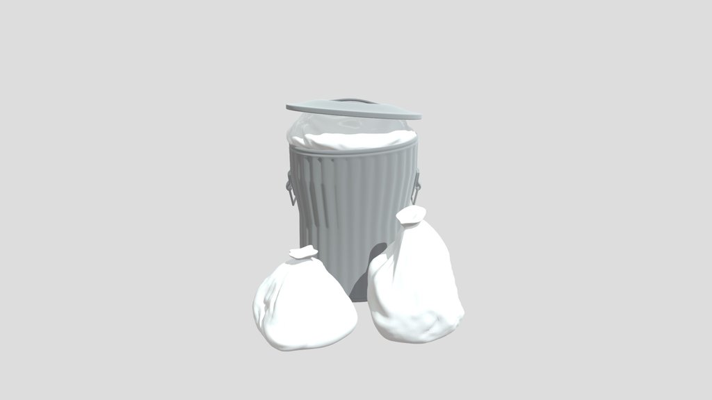 Used Metallic Trash Can With Black Muddy Bags