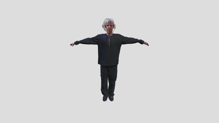 Person standing outdoors with arms outstretched