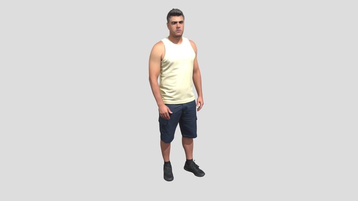 Man In A Yellow Tank Top And Navy Cargo Shorts