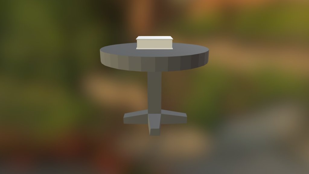 Mesa com livro em cima