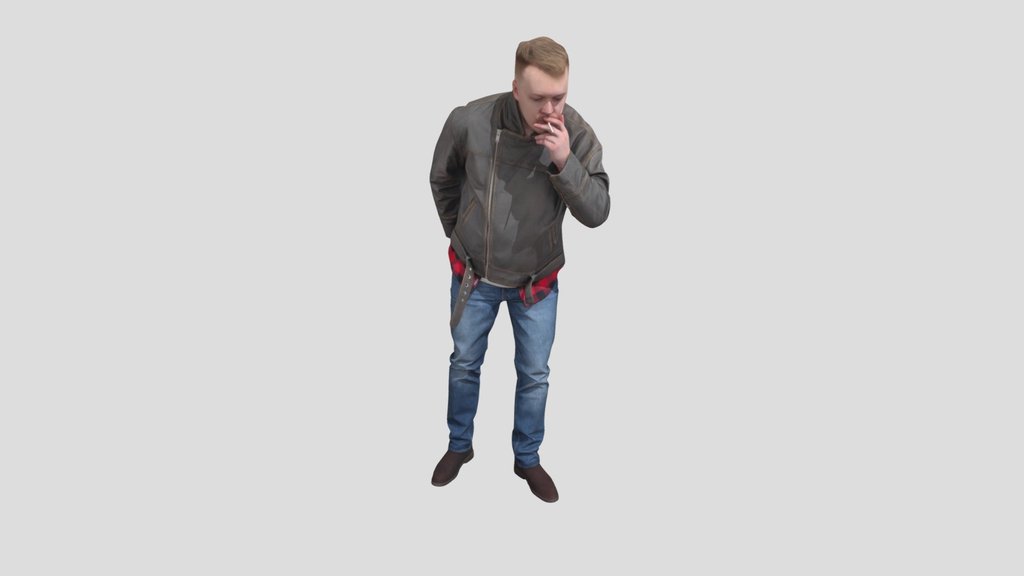 Handsome Man Lights A Cigarette