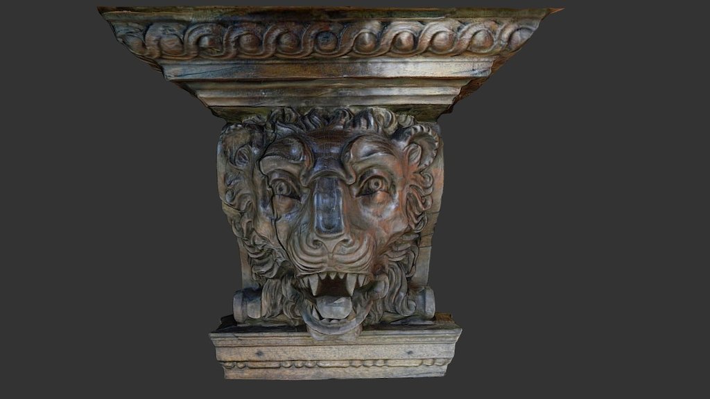 Wooden head from above a fireplace (3)