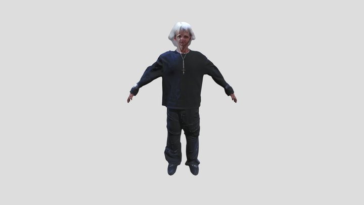 Person standing with arms outstretched in a gar