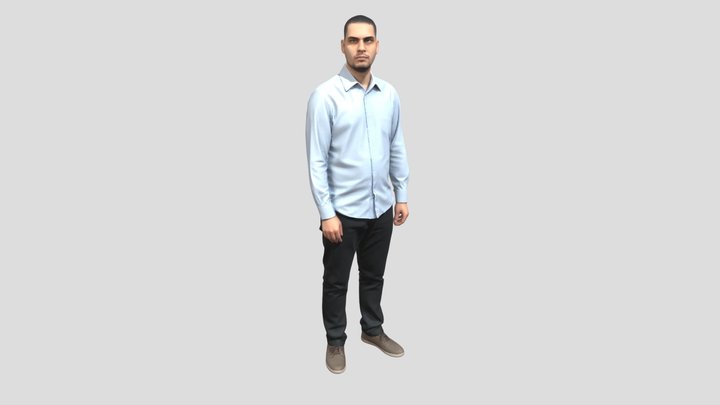 Portrait Of A Man In A Light Blue Shirt