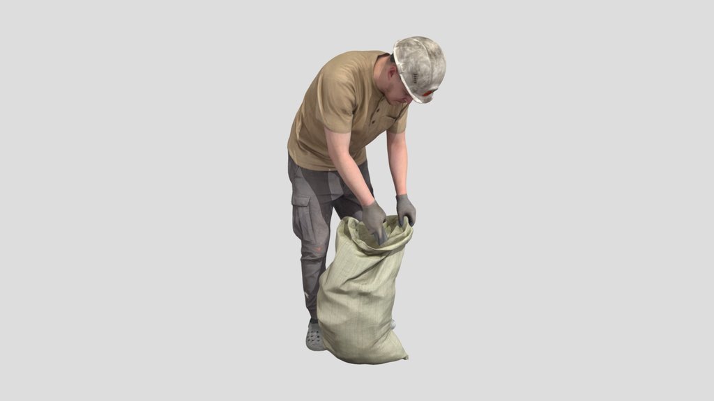 Worker Picks Up Garbage In A Bag