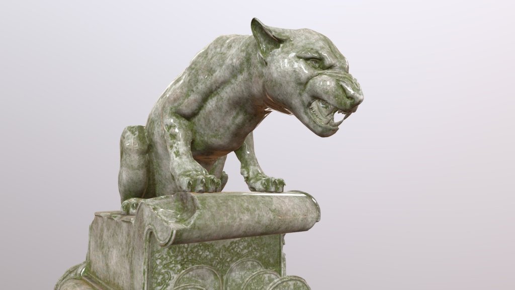 Weathered lion statue