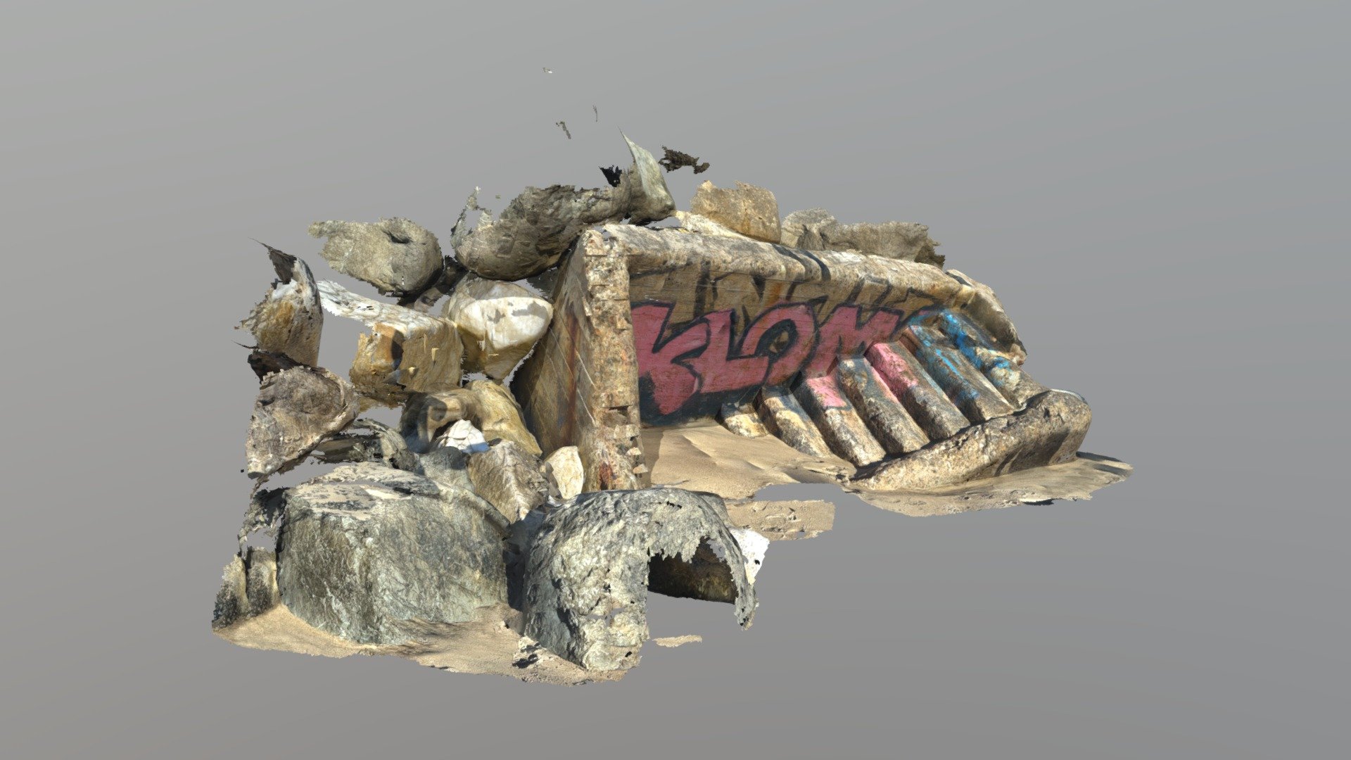 Scan of sunken stairs with graffiti on the beach