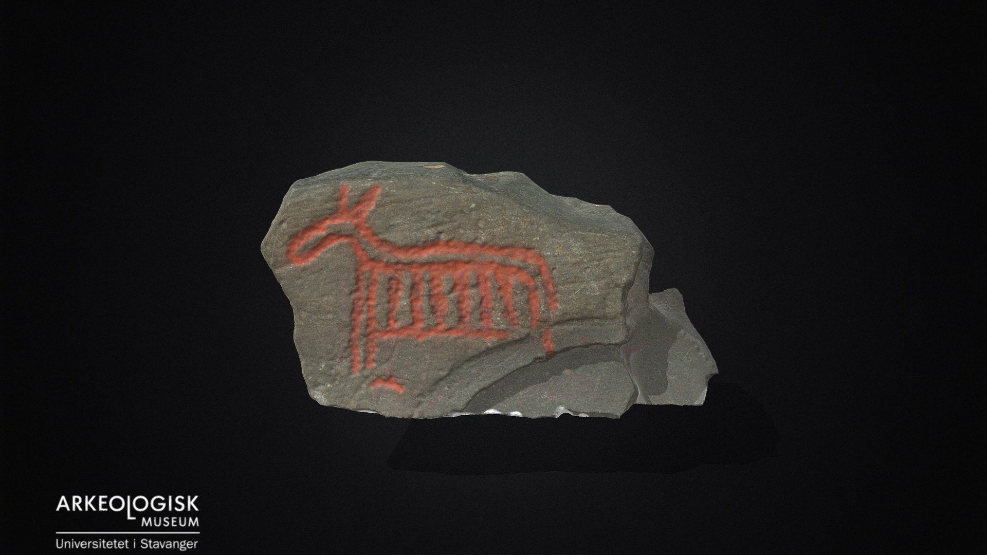 Rock carving with animal figure.