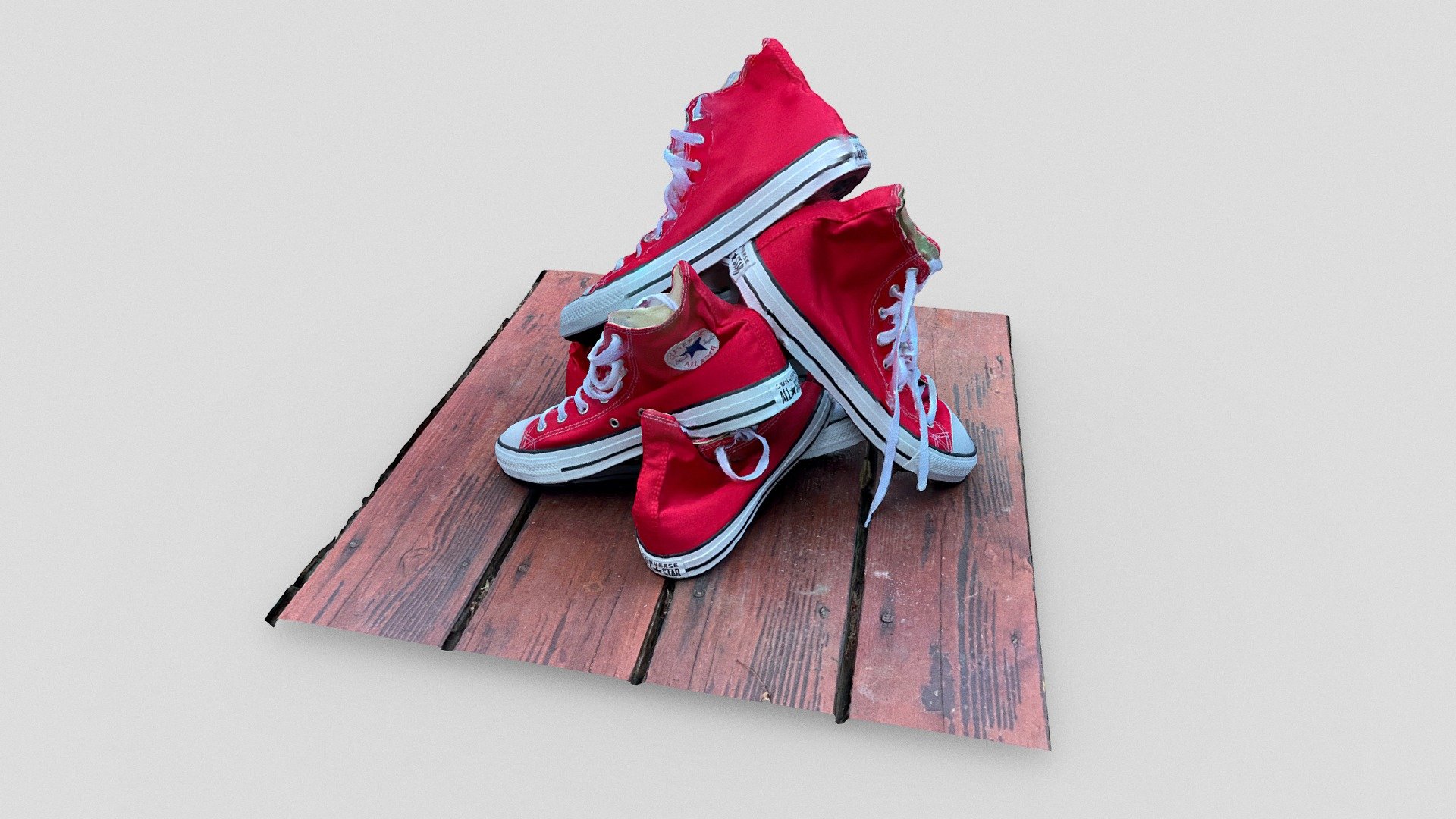 A bunch of Converse shoes