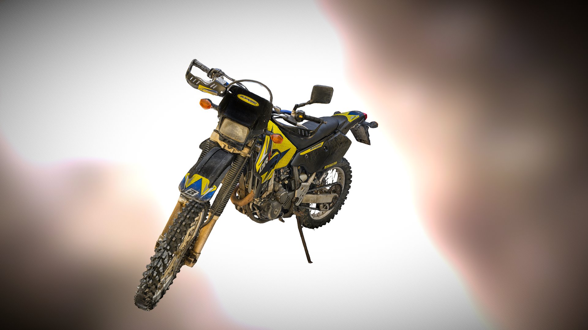 3D model Suzuki bike DRZ 400 E isolated scan 100k - This is a 3D model of the Suzuki bike DRZ 400 E isolated scan 100k. The 3D model is about a motorcycle flying through the air.