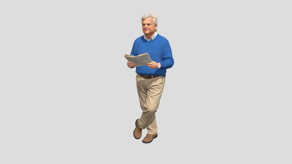 Older man reading a newspaper