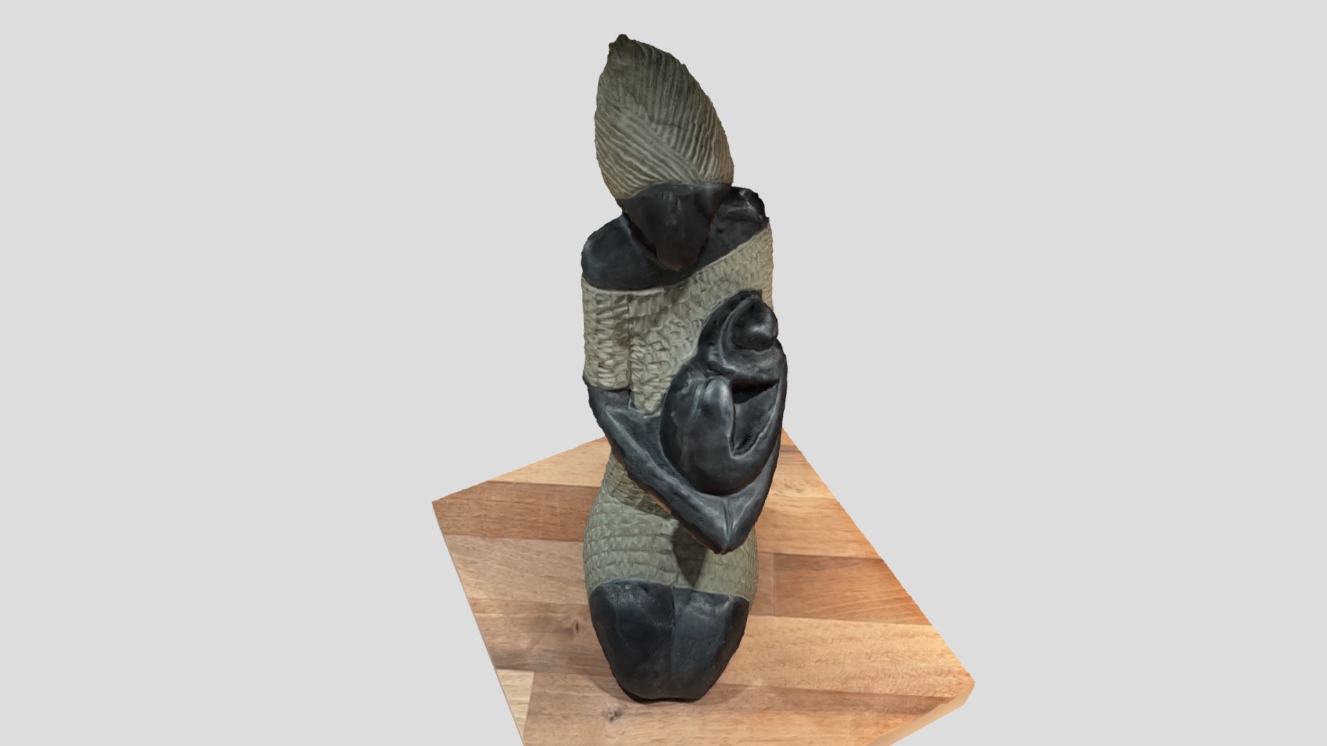 haitian statue: woman with her child