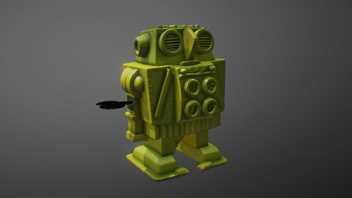 Yellow plastic wind-up robot with a key
