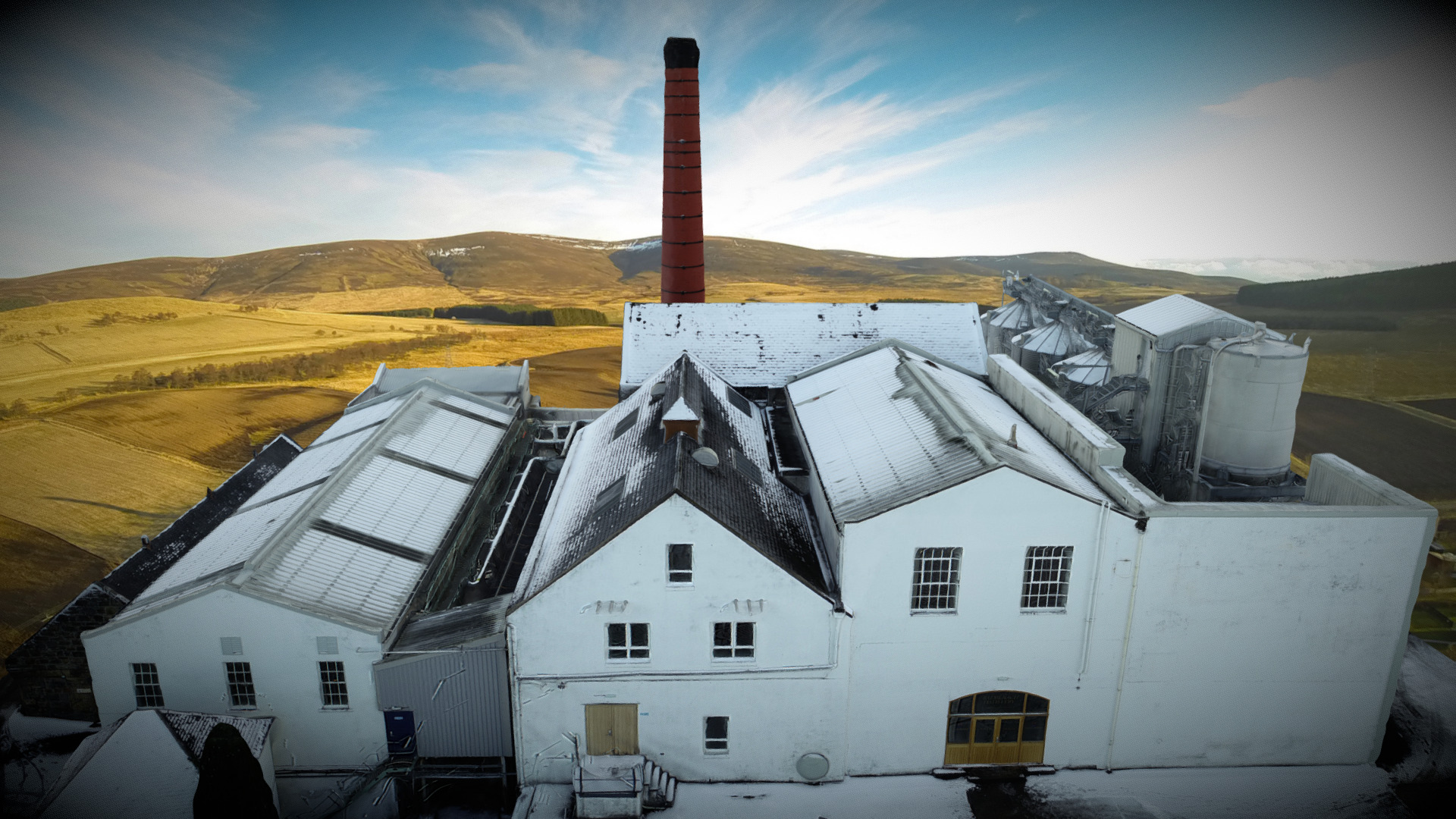 3D model Balmenach Distillery Snow AerialScotland - This is a 3D model of the Balmenach Distillery Snow AerialScotland. The 3D model is about a white building with a tower in the background.