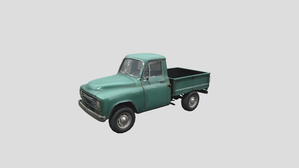 A green pickup truck
