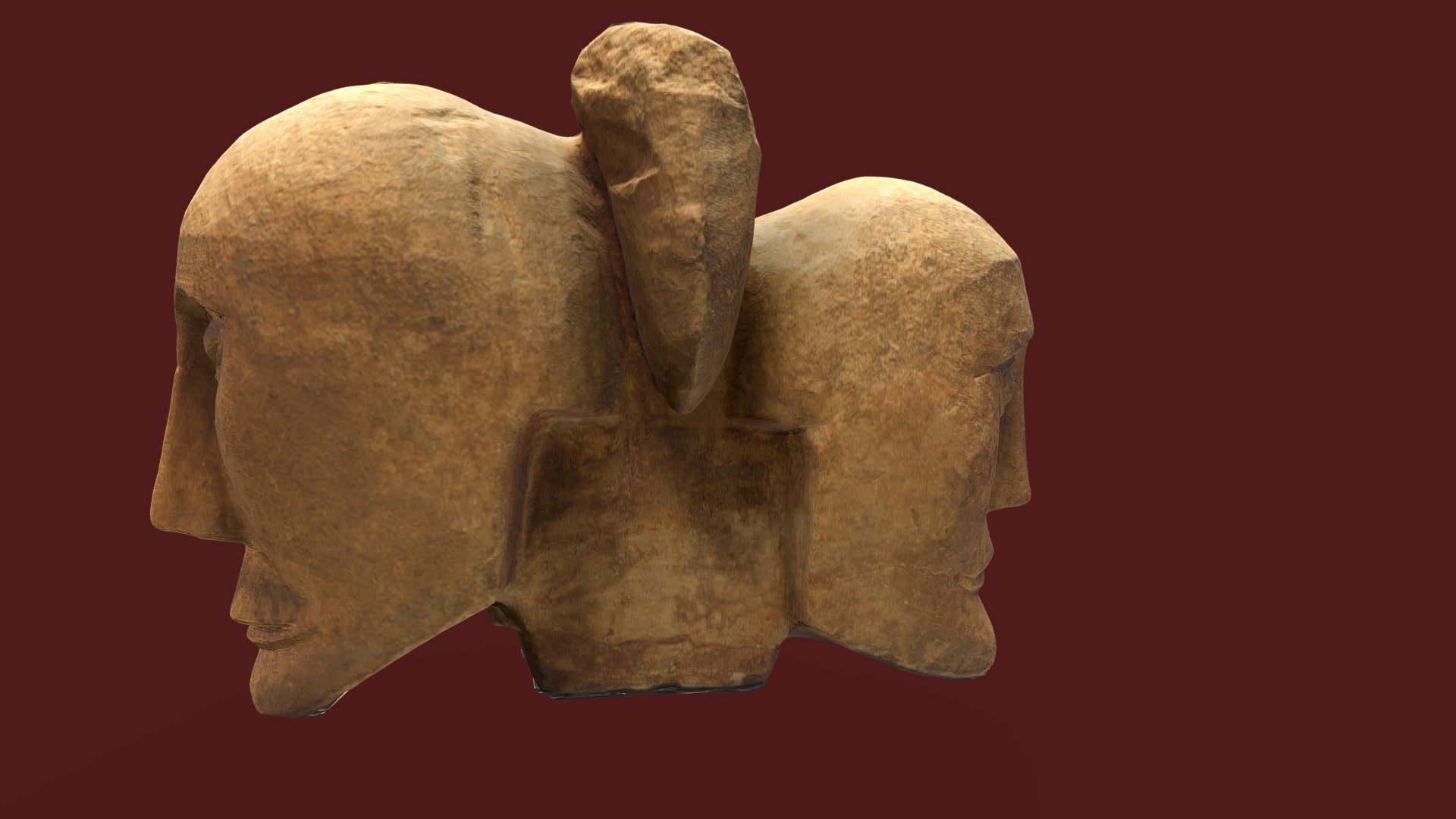 Sculpture de deux têtes accolées Two-headed