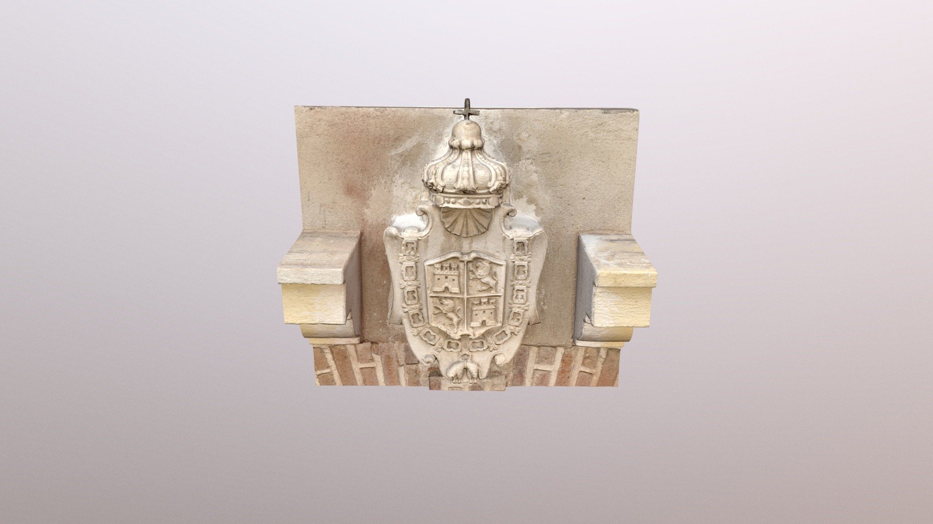 Escudo de la portada del Santuario de la Caridad