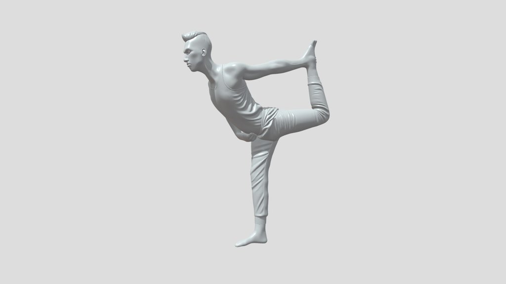 Man doing yoga pose by lake