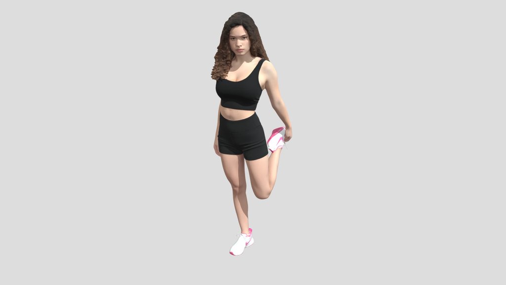 Stretching Pose in Black Workout Set