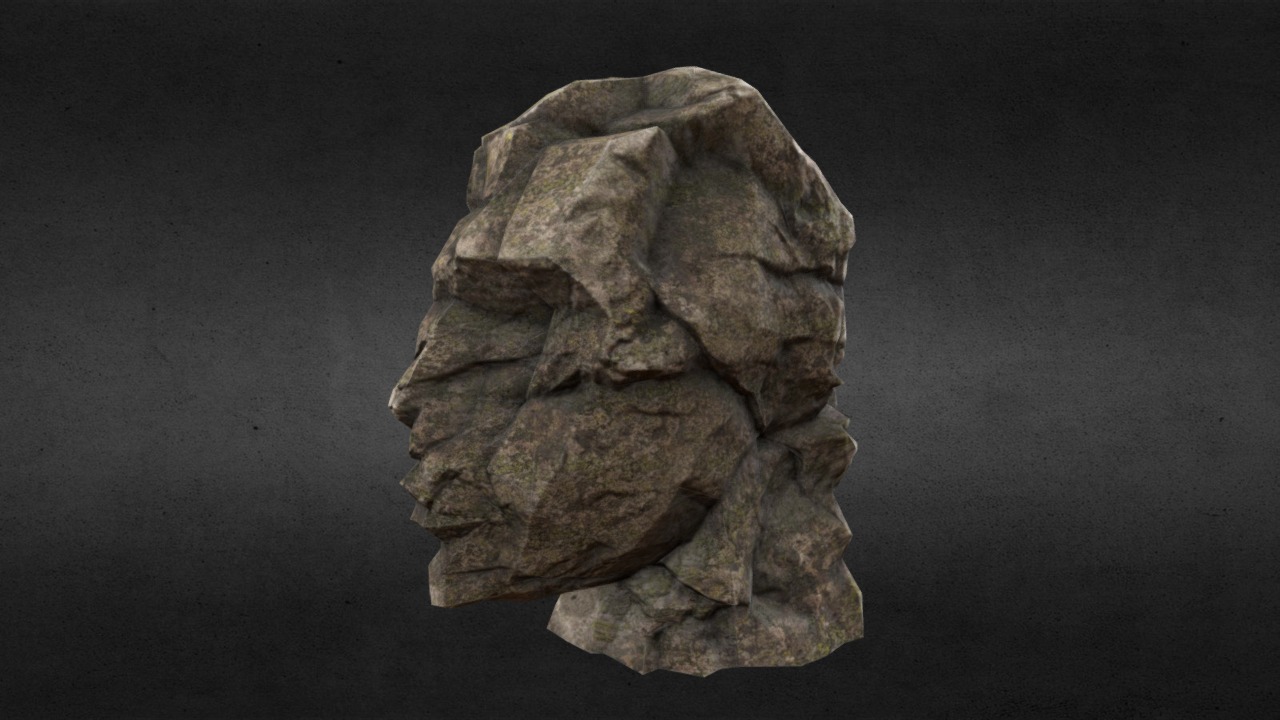 3D model Ancient Large Broken Statue Head – Low Poly - This is a 3D model of the Ancient Large Broken Statue Head - Low Poly. The 3D model is about a rock with a face carved into it.
