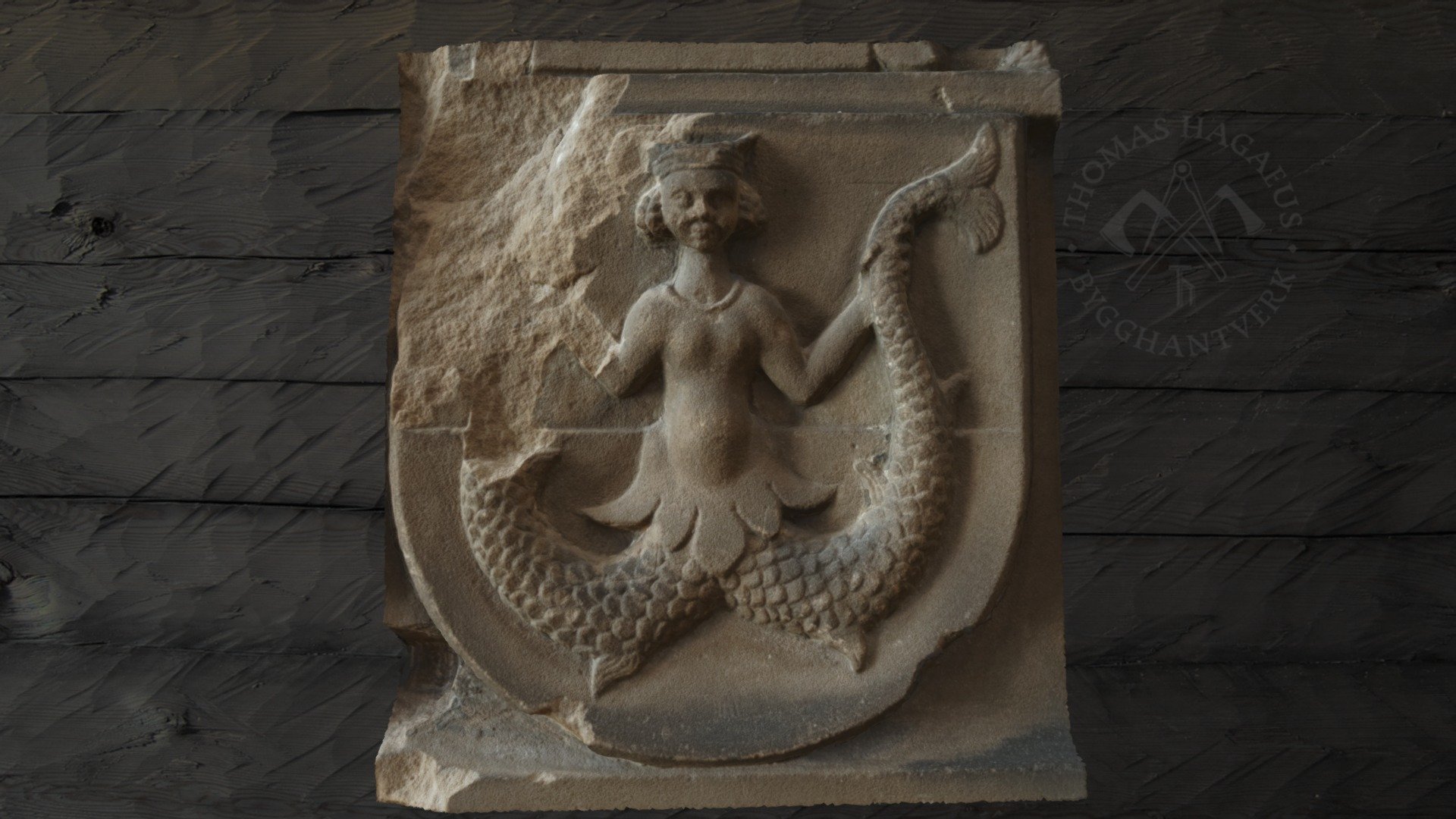 Heraldic Melusine in stone