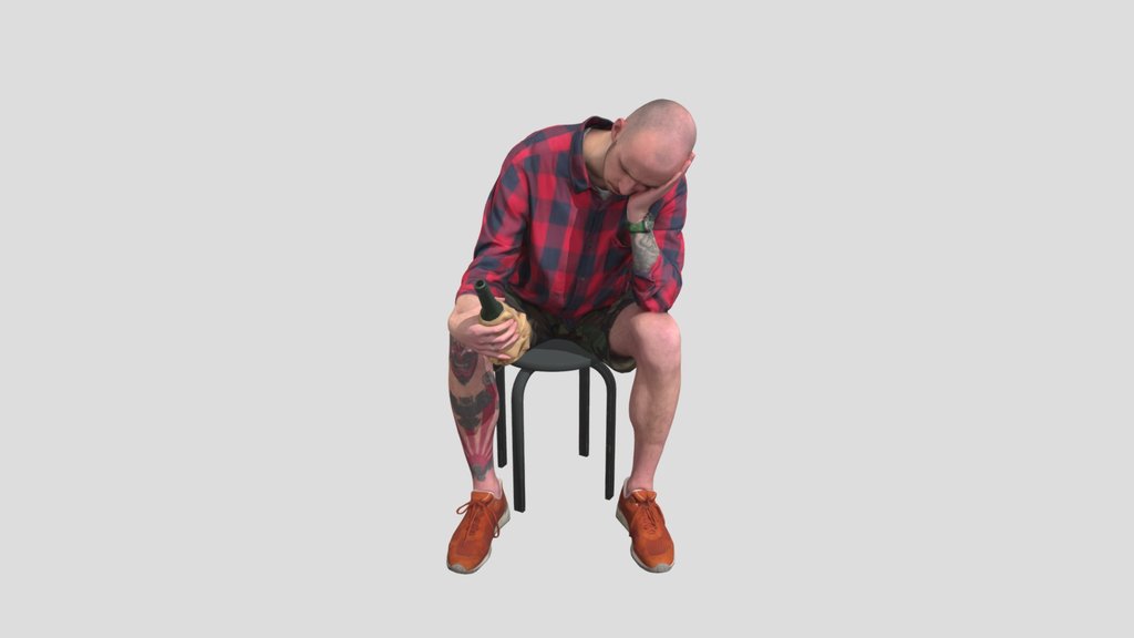 Subdued Revelry Tattooed Man