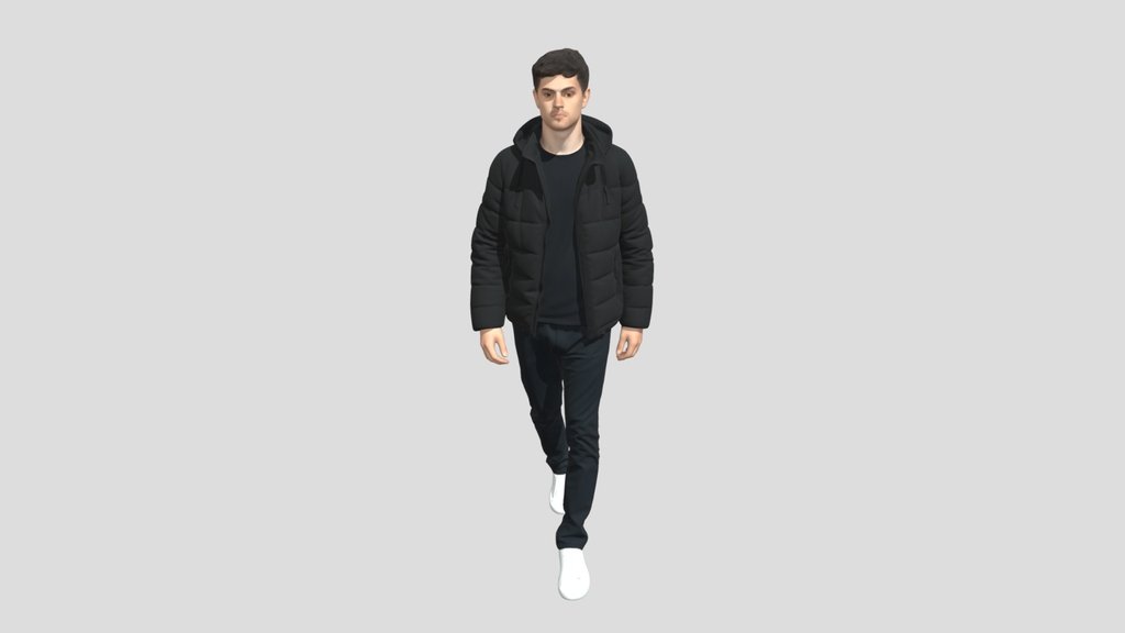 Man in a Black Puffer Jacket Walking