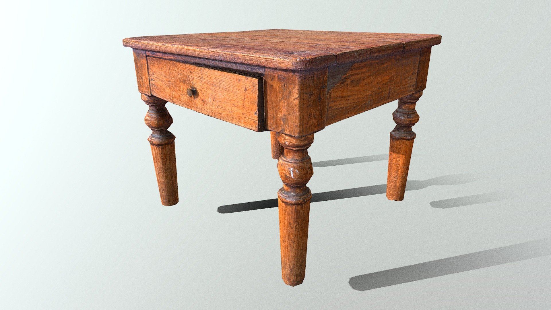 Scanned small coffee table with a drawer