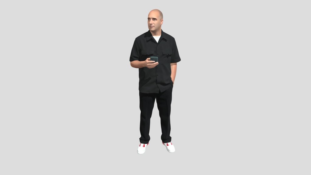 Black-Clad Man with Smartphone