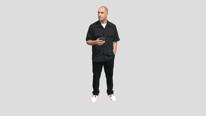 Black-Clad Man with Smartphone