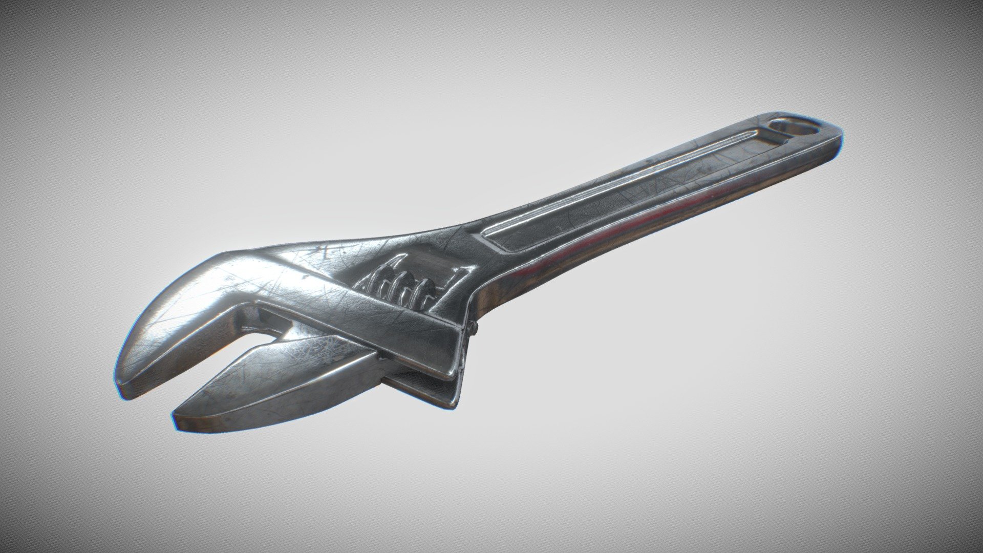 Adjustable metal wrench.