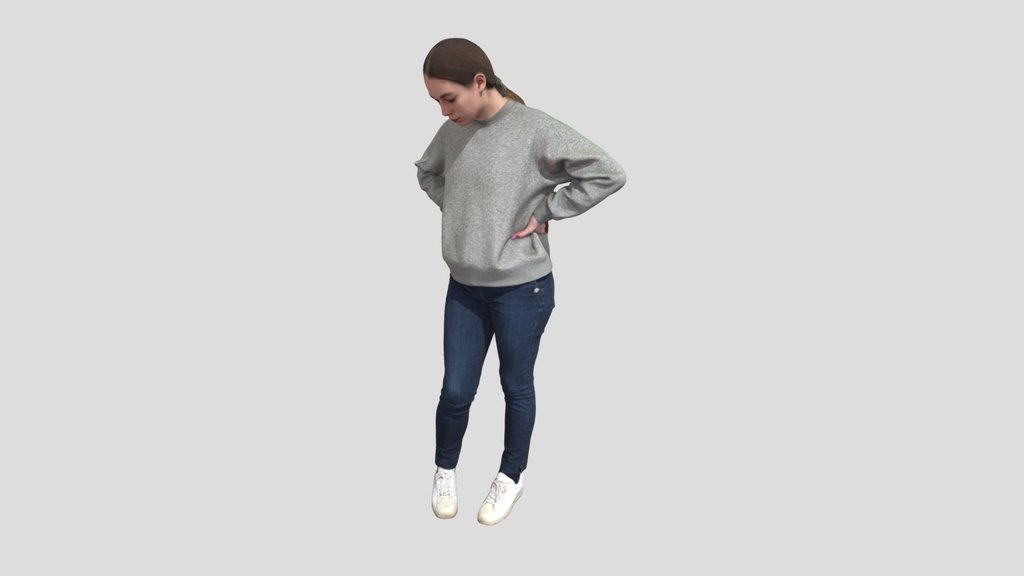 Standing Girl In Sweatshirt And Jeans