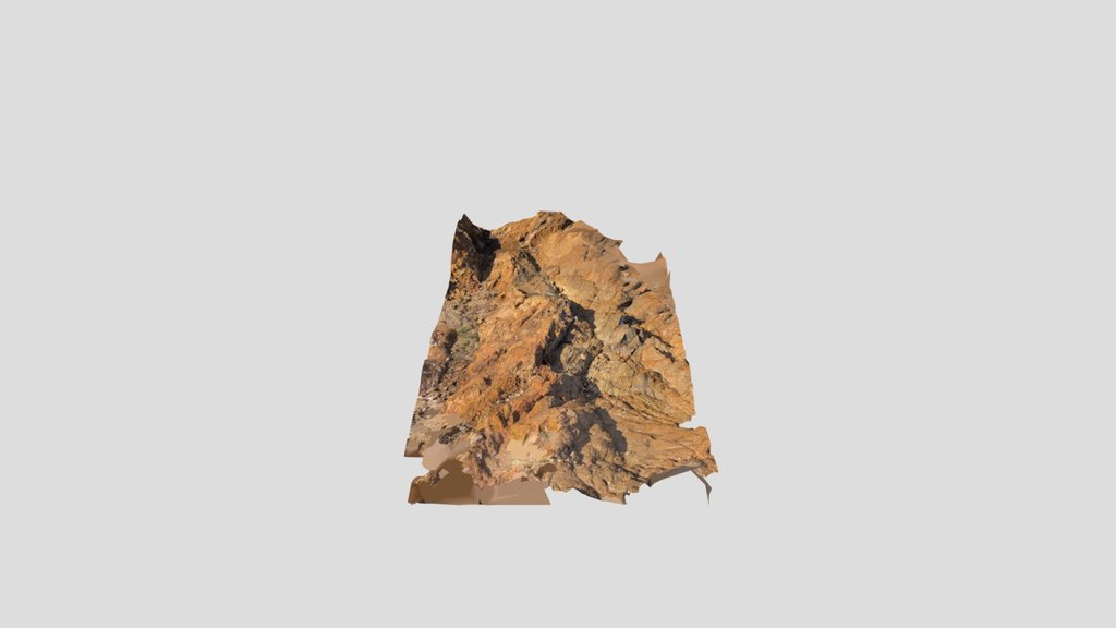 Rock mound by lake