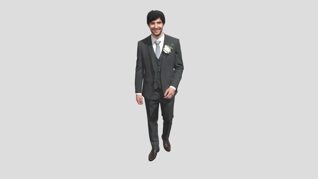 Groom in a gray three-piece suit
