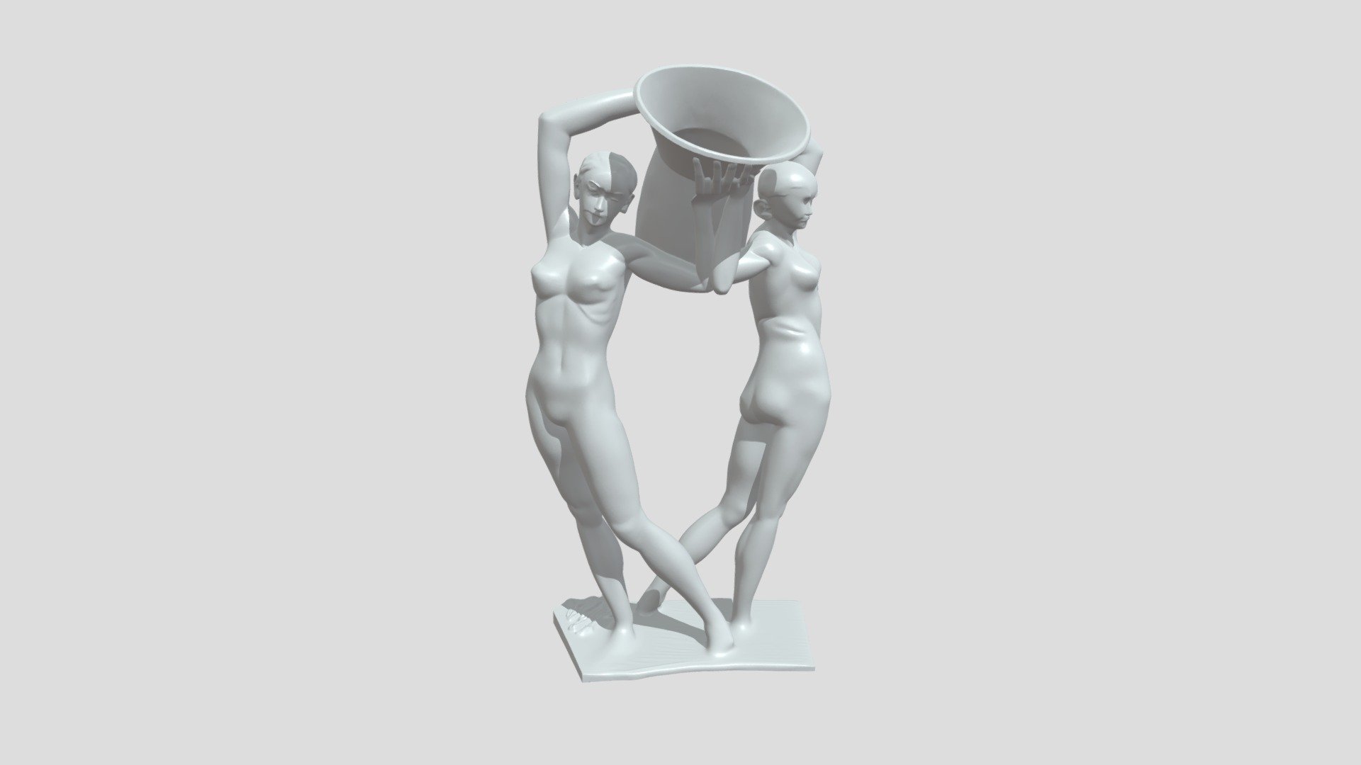 Statue of two human figures holding