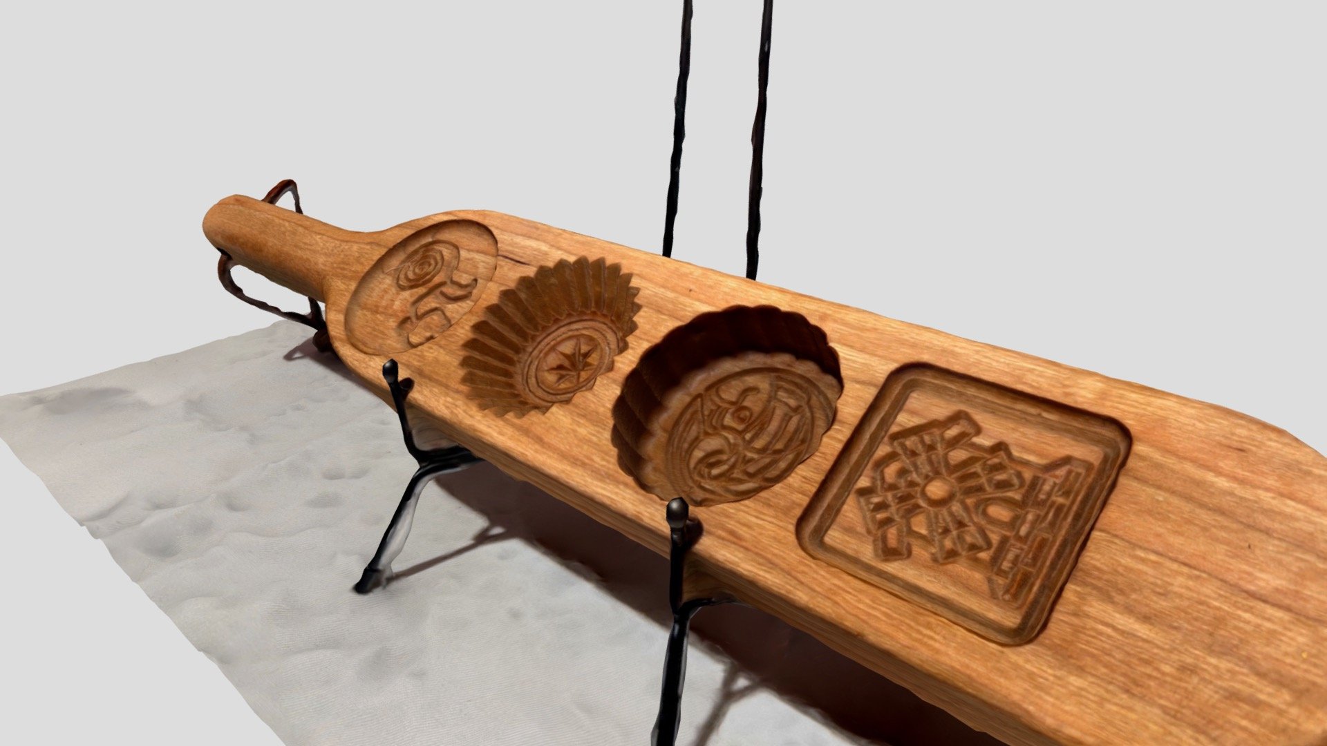 A wooden cultural ornament made by MIT students