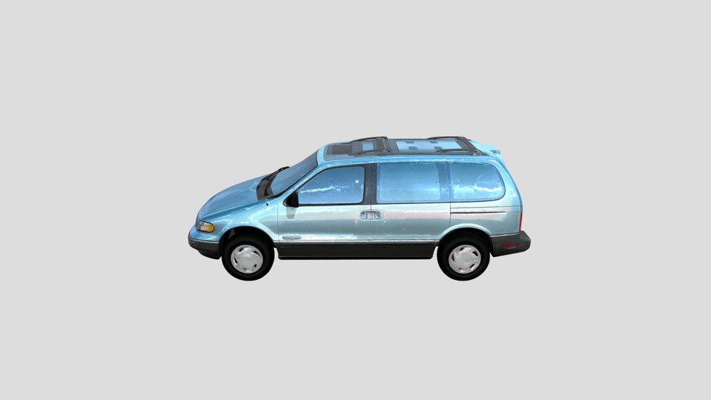 Light Blue Minivan by the Garage