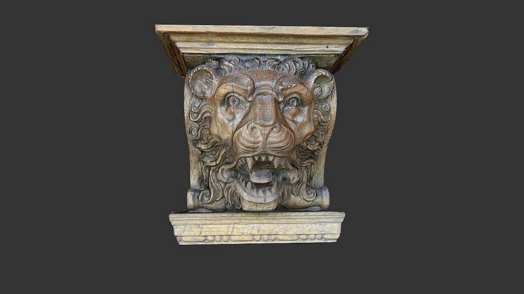 Wooden head from above a fireplace (2)