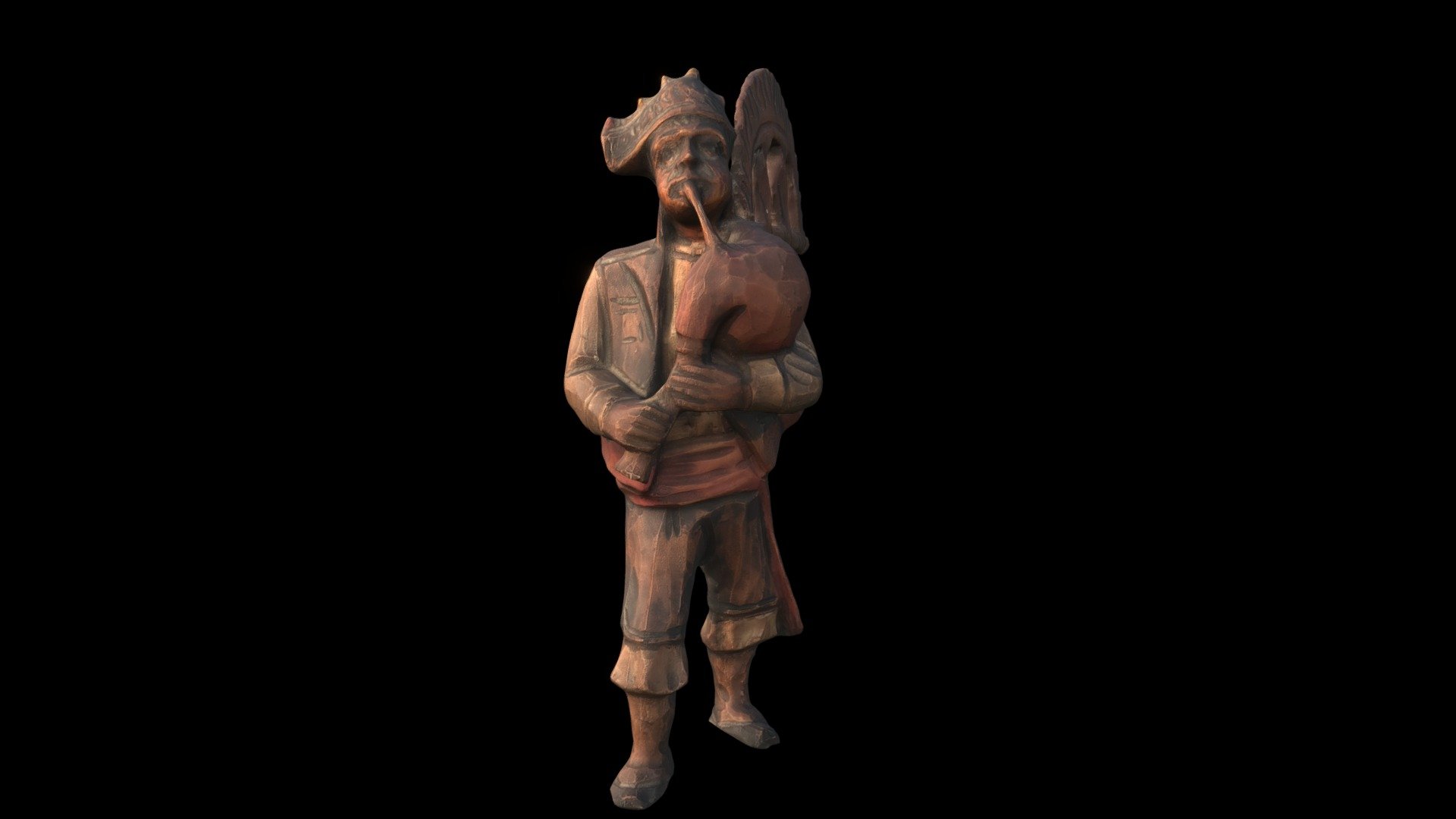 man playing bagpipes wood carving photo scan